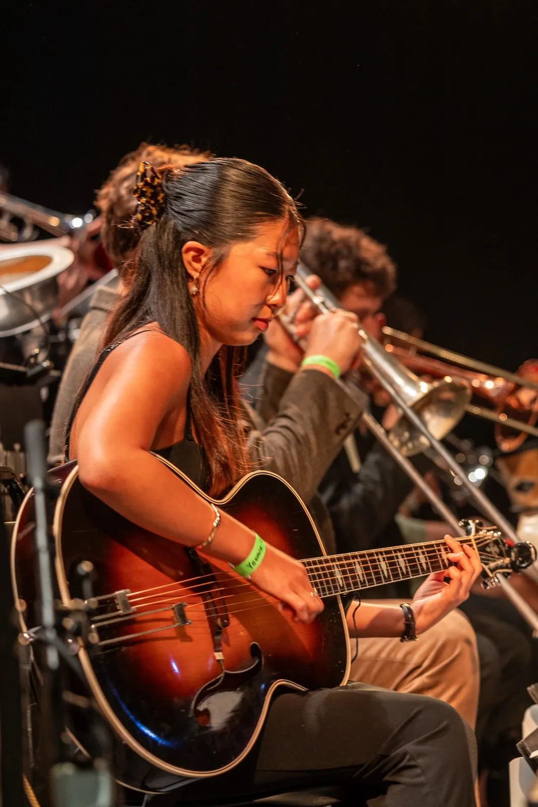 Guitarist Yoomin Kim in a vertical shot
